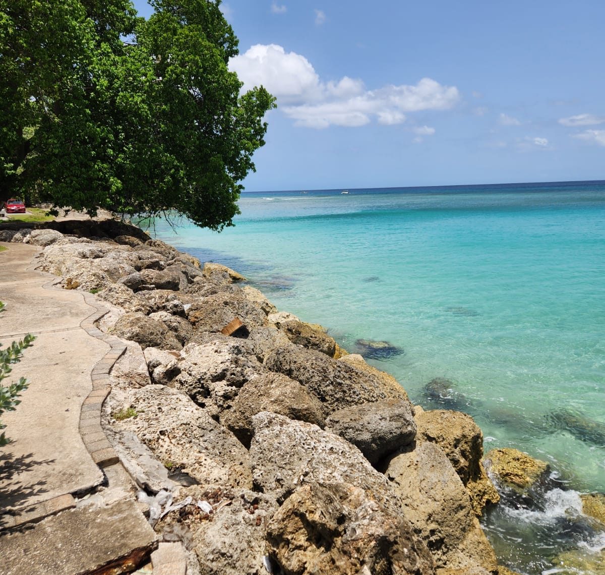 Blue beach with big stones in Barbados