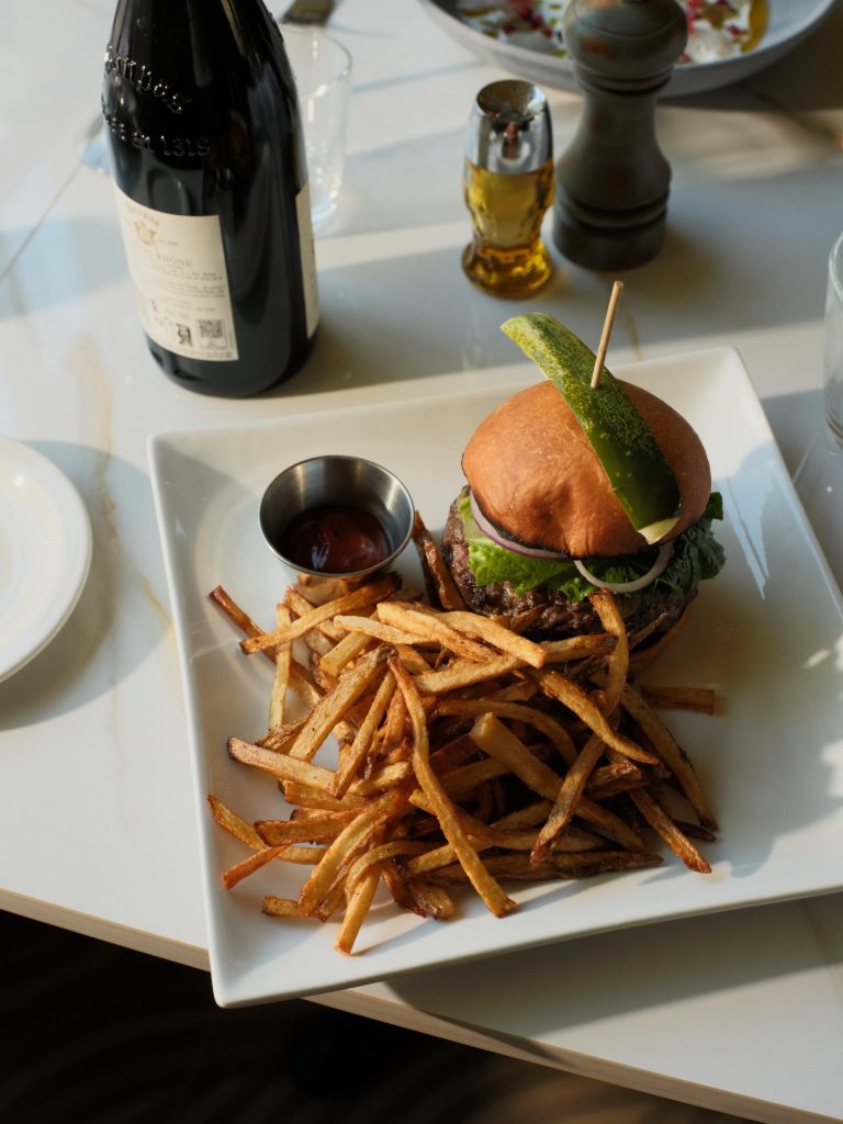 burger and fries with ketchup on the side