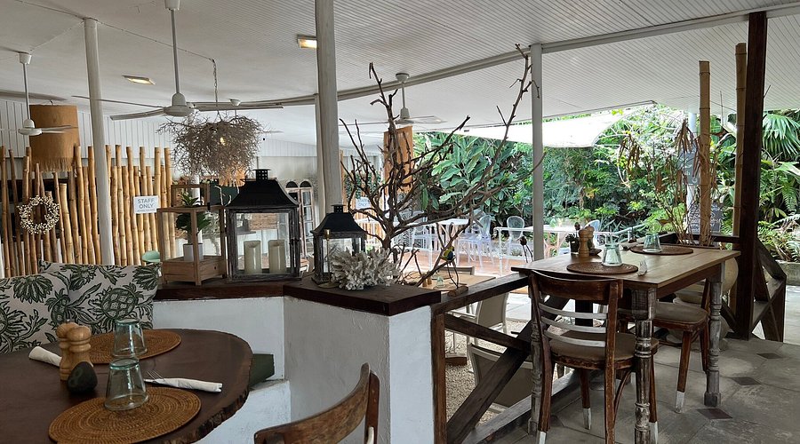 restaurant inside with chairs around a counter