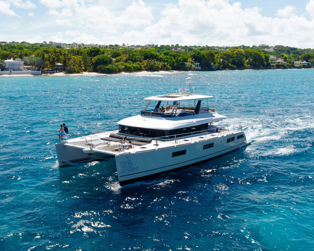 catamaran on the blue oceanwith beach behind