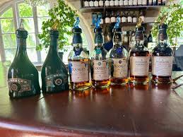 bottles of foursquares rum aligned on a counter