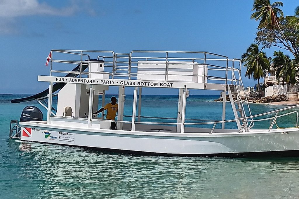 boat docked by a beach