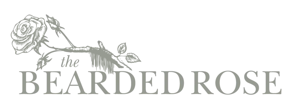 bearded rose logo with rose above grey text